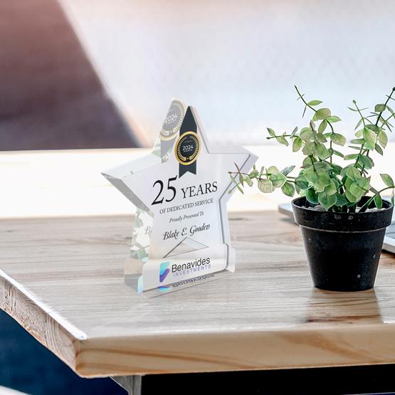 Custom Printed Freestanding Acrylic Award For 25 Years Of Service On Desk Near Plant