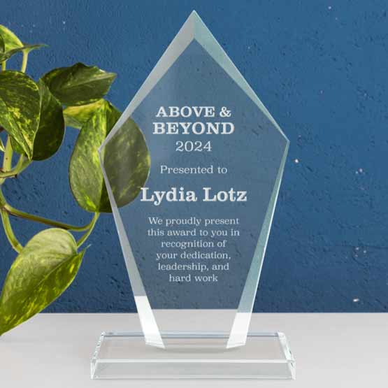 Custom Engraved Glass Diamond Award With Your Text And Logo On Desk Near Plant