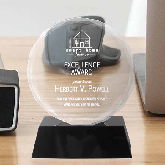 Faceted Glass Circle Awards on Desk