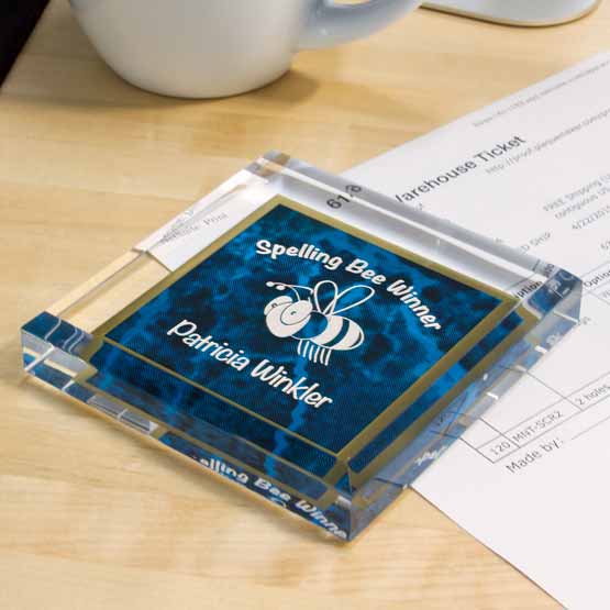 Blue Acrylic Paperweight on Desk