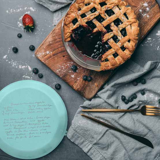 Pie Pan with Teal Lid on Table