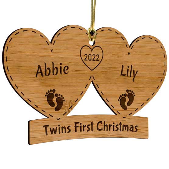 Personalized Twins First Christmas ornament crafted from Eco-friend Bamboo. Easily customizable and comes with gold string