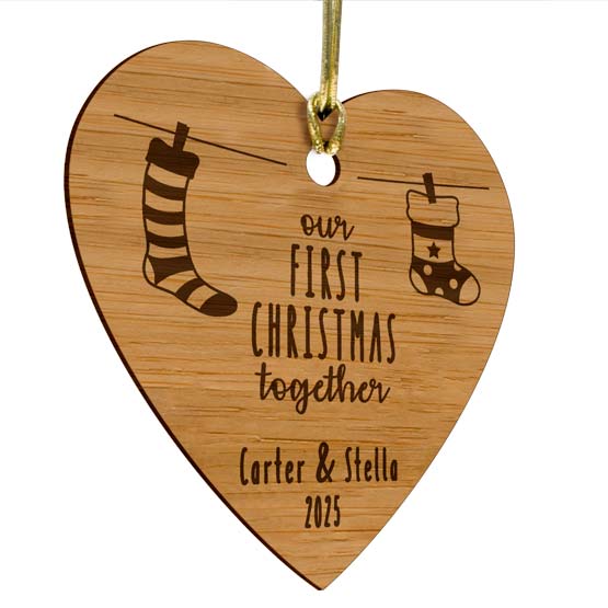 Customizable Hanging Stocking Ornament made from eco-friendly bamboo in the shape of a heart with holiday scene engraved.