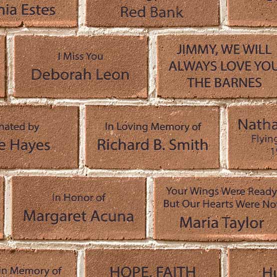 Engraved Bricks Making a Wall