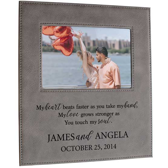 Customizable Heart Beats Faster gray faux leather frame. Holds a 5” x 7” landscape photograph, design is laser engraved.