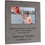 Customizable Heart Beats Faster gray faux leather frame. Holds a 5” x 7” landscape photograph, design is laser engraved.