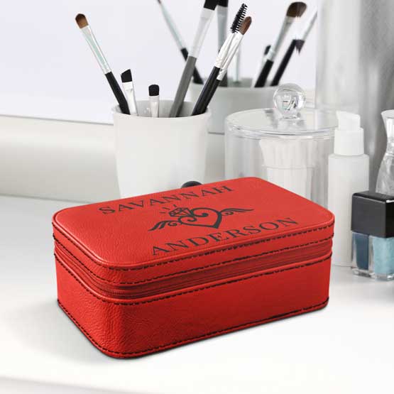 Red Faux Leather Jewelry Box With Custom Names And Art Displayed On White Dresser With Makeup Essentials
