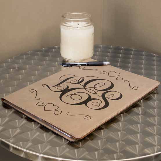 Brown Leather Notebook on Table