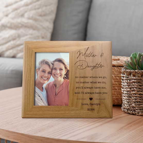 Custom Engraved Mother and Daughter Picture Frame for Mom on table near couch.