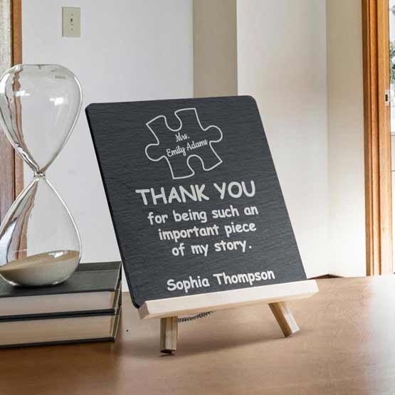 Custom Engraved Piece of My Story Slate Slab on Wooden Easel. This gift is sitting on a countertop.