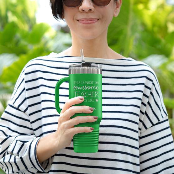 Custom Engraved 40 oz Green Tumbler with Handle Held by Teacher in Sunglasses
