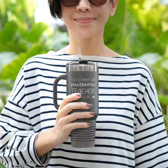 Custom Engraved 40 oz Gray Tumbler with Handle Held by Teacher in Sunglasses