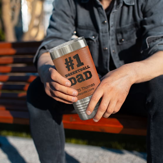 Man Sitting On Park Bench Holding Basketball Wrapped Coffee Tumbler Featuring Custom Number One Basketball Dad Text