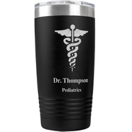 An easy designed tumbler with the caduceus medical symbol on the front and personalized with a person’s name and title.