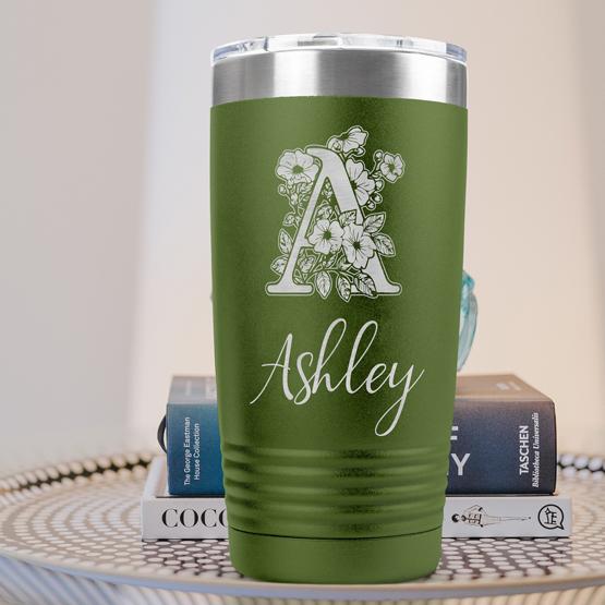 Custom Engraved 20 oz Olive Green Tumbler on a side table with books
