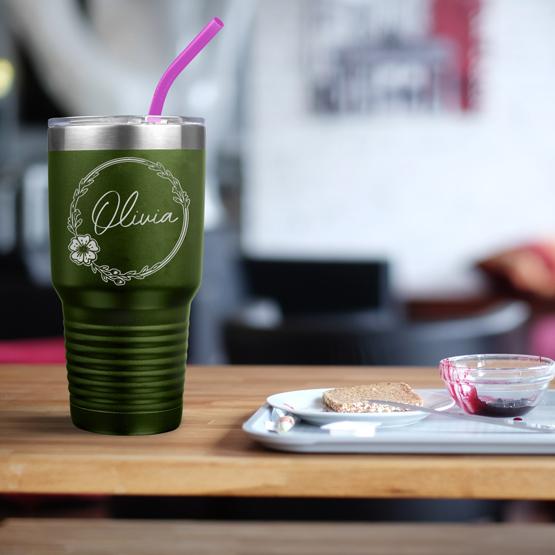 Custom Engraved 30 oz Olive Green Tumbler on a table next to breakfast with sample engraving for Olivia