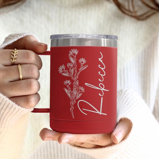 Custom Engraved 15 oz Red Tumbler Mug being held by a woman with a sample engraving for Rebecca