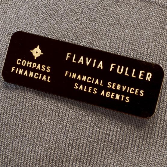 Laser Metal Name Tag on Gray Shirt