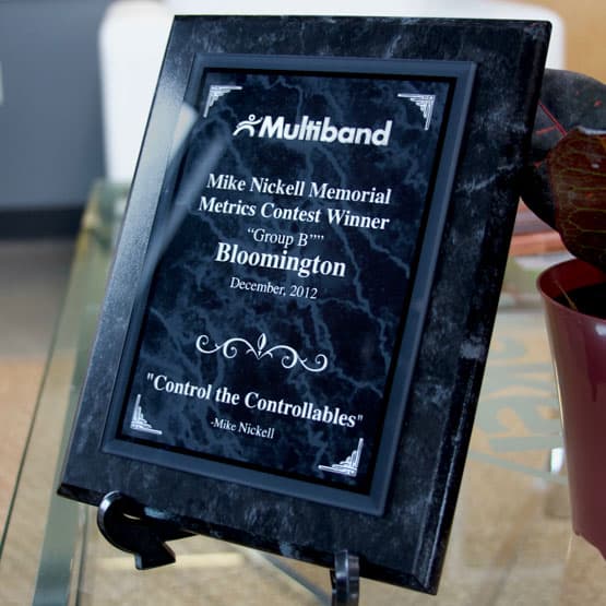 Custom Black Acrylic Plaque on Desk