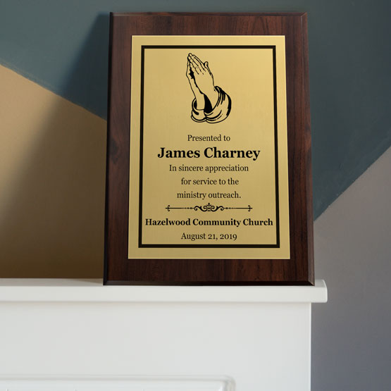 Religious Plaque on White Shelf