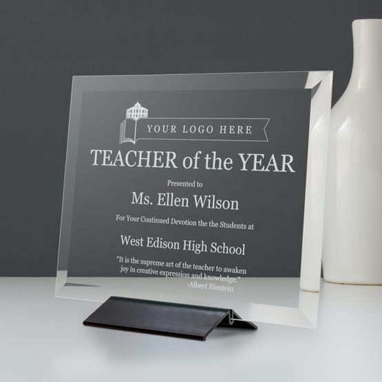 Custom Frosted Engraved Glass Plaque Engraved for Teacher of the Year on Desk near Gray Wall