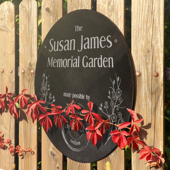 Granite Circle Plaque on Fence