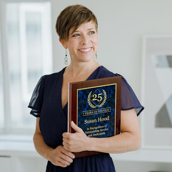 Woman holds Custom Laser Plaque