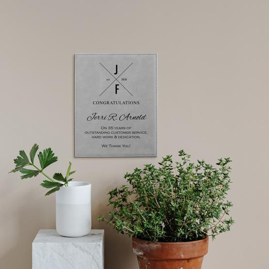 Gray Leatherette Plaque on Wall