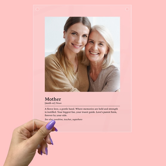 Person holding Clear Acrylic Sign Mother Definition Gift with personalized definition and picture.