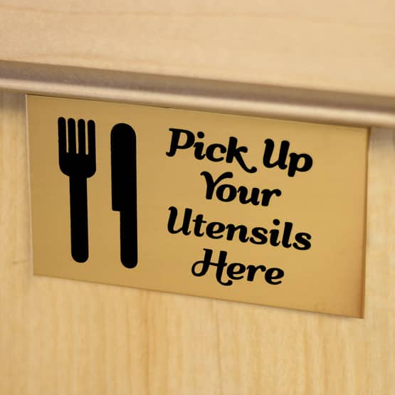 Bronze Wall Tag on Cabinet Door