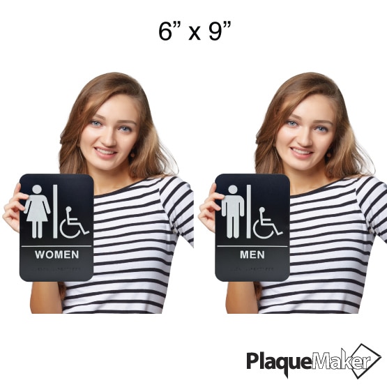 Size Guide Of Woman Holding 6 By 9 Black And White Plastic Signs For Men And Women’s Restrooms With Wheelchair Access