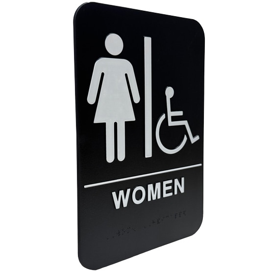 Custom Black And White Plastic Sign With Women And Wheelchair Icons Above Women Text And Corresponding Braille